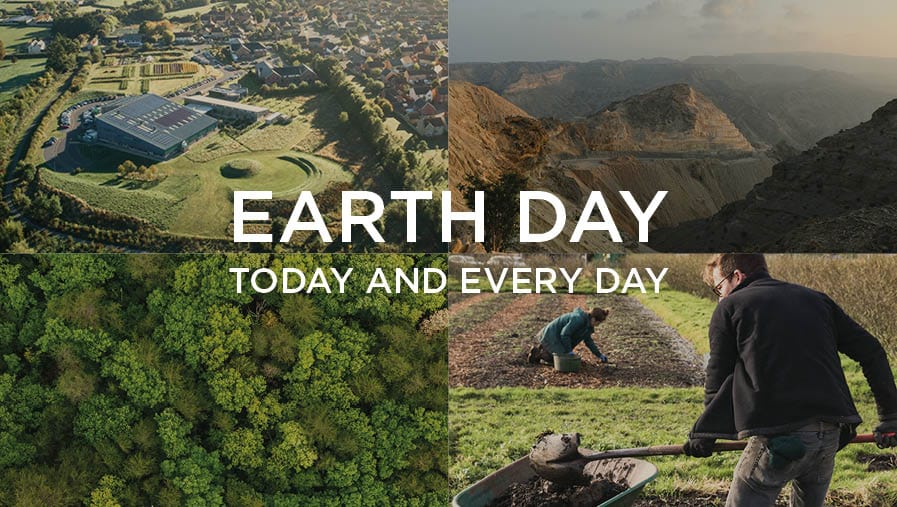 Neal's Yard Remedies blue bottle on a Union Jack flag made of flowers