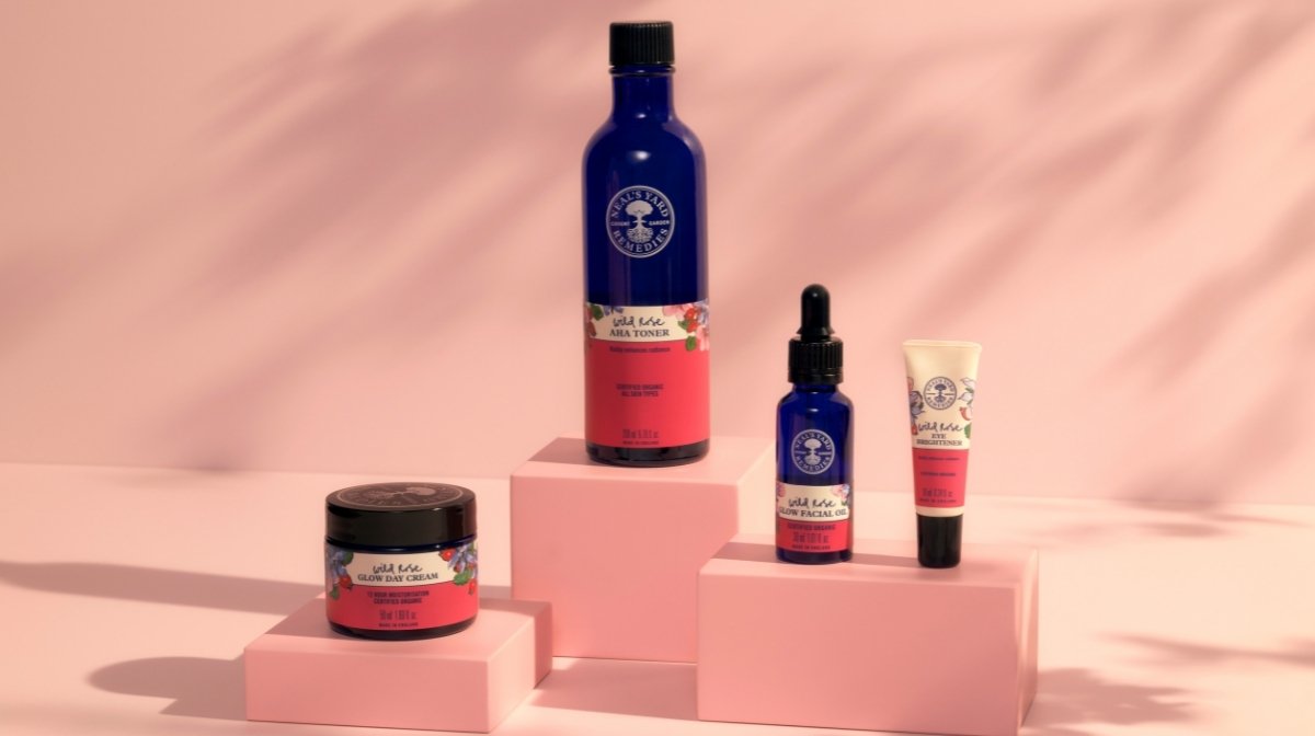 Wild Rose AHA Toner, Wild Rose Glow Day Cream and Wild Rose Eye Brightener on plinths