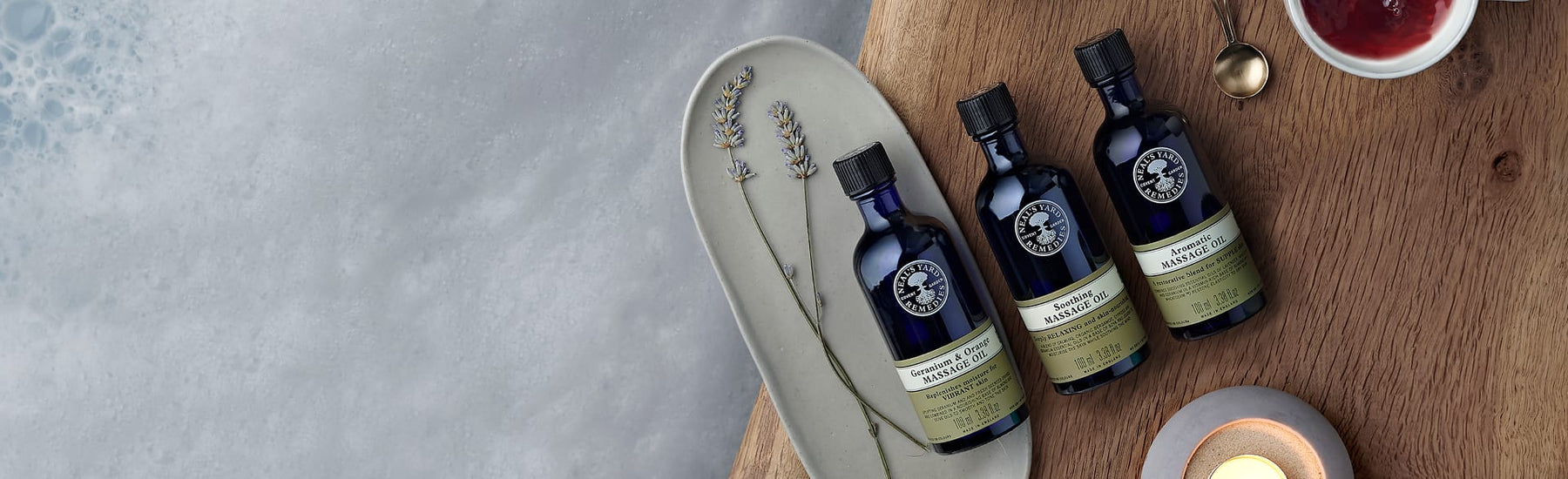 PIcture of three bottles of massage oils by Neal's Yard Remedies