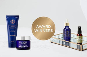 Picture of  four award winning products by Neal's Yard Remedies
