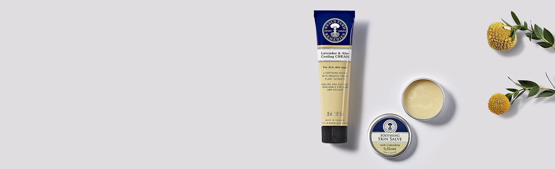 Picture of herbal cream and salve with botanical background by Neal's Yard Remedies