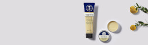 Picture of herbal cream and salve with botanical background by Neal's Yard Remedies